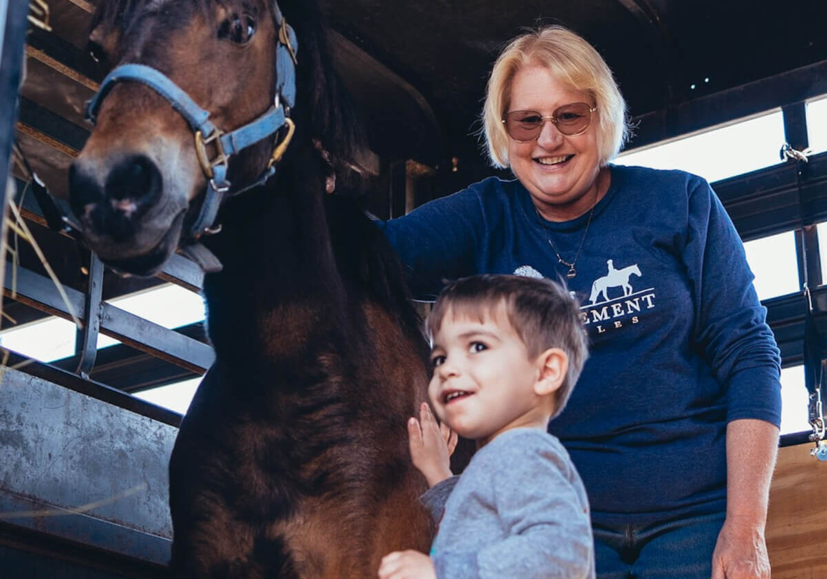 En-Tice-Ment Stables Owner Deana Tice with "Muffin" the pony